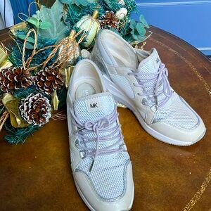 Michael kors sneakers, wedge.   Worn.   Decent shape